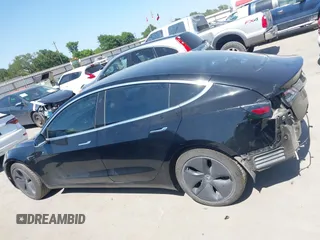 2018 Tesla Model 3 Long Range Battery with VIN 5YJ3E1EA7JF098632, listed as a IAAI auction lot 42002181 with 73,371 mi miles and . Bid and sale history available at DreamBid. Image 15.