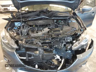 2014 Mazda 3 S Grand Touring with VIN JM1BM1W31E1182703, listed as a IAAI auction lot 41470742 with 123,956 mi miles and . Bid and sale history available at DreamBid. Image 10.
