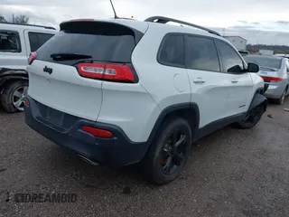 2016 Jeep Cherokee Latitude with VIN 1C4PJMCSXGW214243, listed as a IAAI auction lot 40850362 with 96,240 mi miles and . Bid and sale history available at carsss.com. Image 4.