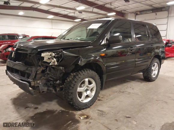 2007 Honda Pilot LX with VIN 5FNYF18117B009290, listed as a IAAI auction lot 41205310 with 150,081 mi miles. Bid and sale history available at carsss.com. Image 22.