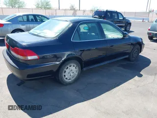 2002 Honda Accord LX with VIN 1HGCG554X2A173346, listed as a IAAI auction lot 42503168 with 235,249 mi miles and . Bid and sale history available at DreamBid. Image 4.