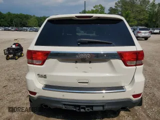 2012 Jeep Grand Cherokee Limited z VIN 1C4RJFBT0CC287342, wystawiony jako Copart lot #57000525 z przebiegiem 135 655 mil mil oraz Szkoda całkowita • Salvage title. Historia ofert i sprzedaży dostępna na DreamBid. Obrazek 6.