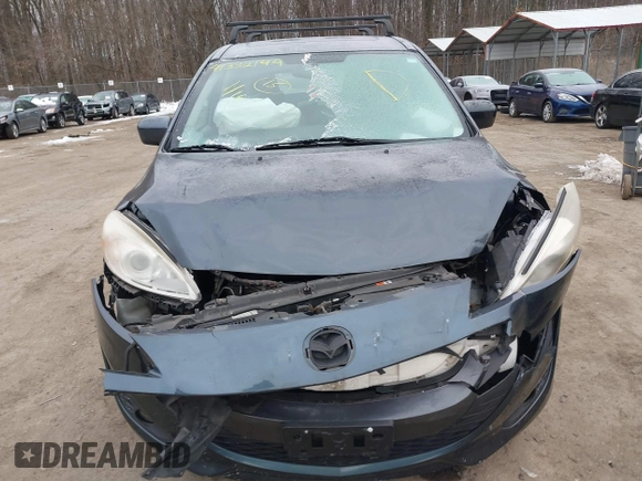2012 Mazda 5 Touring with VIN JM1CW2CL6C0107233, listed as a IAAI auction lot 41332199 with 130,428 mi miles and . Bid and sale history available at DreamBid. Image 12.