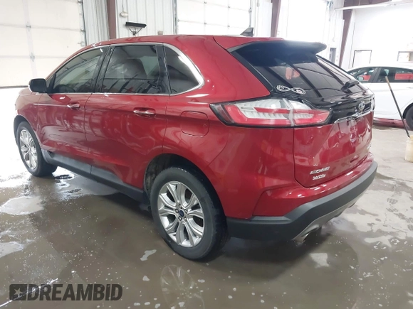 2020 Ford Edge Titanium z VIN 2FMPK4K98LBB39819, wystawiony jako IAAI lot #41947377 z przebiegiem 69 467 mil mil oraz . Historia ofert i sprzedaży dostępna na DreamBid. Obrazek 3.