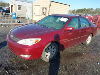 2004 Toyota Camry LE with VIN 4T1BF32K04U074049, listed as a IAAI auction lot 41768724 with 262,296 mi miles and . Bid and sale history available at DreamBid. Image 2.