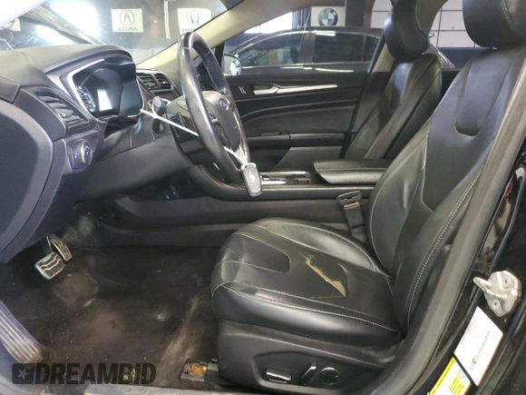 2017 Ford Fusion Titanium z VIN 3FA6P0K96HR124759, wystawiony jako Copart lot #61414395 z przebiegiem 175 655 mil mil oraz Czysty tytuł • Clean title. Historia ofert i sprzedaży dostępna na DreamBid. Obrazek 7.