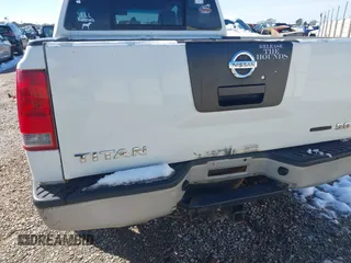 2009 Nissan Titan SE with VIN 1N6BA07D89N306682, listed as a IAAI auction lot 41348877 with 273,365 mi miles. Bid and sale history available at carsss.com. Image 6.