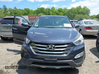 2014 Hyundai Santa Fe with VIN 5XYZUDLB6EG218980, listed as a IAAI auction lot 42391630 with 136,710 mi miles and . Bid and sale history available at DreamBid. Image 12.