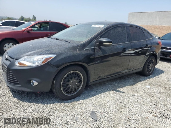 2012 Ford Focus SE with VIN 1FAHP3F22CL372232, listed as a Copart auction lot 59637645 with 134,337 mi miles and Salvage title. Bid and sale history available at DreamBid. Image 1.