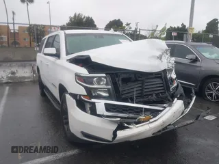 2019 Chevrolet Suburban LT with VIN 1GNSCHKCXKR172323, listed as a IAAI auction lot 41582102 with 101,402 mi miles and . Bid and sale history available at DreamBid. Image 1.