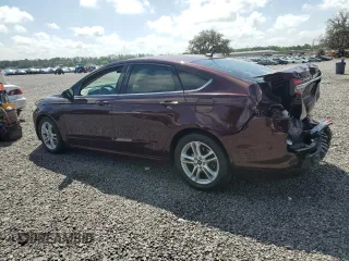 2018 Ford Fusion SE with VIN 3FA6P0H7XJR127739, listed as a Copart auction lot 51217245 with 111,392 mi miles and Salvage Title. Bid and sale history available at DreamBid. Image 2.
