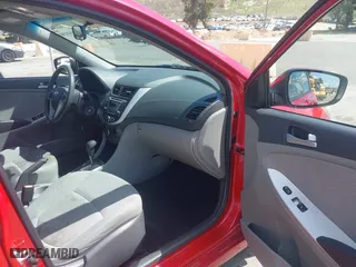 2014 Hyundai Accent GS with VIN KMHCT5AE9EU174866, listed as a IAAI auction lot 41948180 with 117,985 mi miles. Bid and sale history available at carsss.com. Image 5.