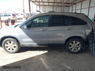 2007 Honda CR-V EX-L with VIN JHLRE387X7C069804, listed as a IAAI auction lot 41616256 with 136,271 mi miles. Bid and sale history available at carsss.com. Image 15.