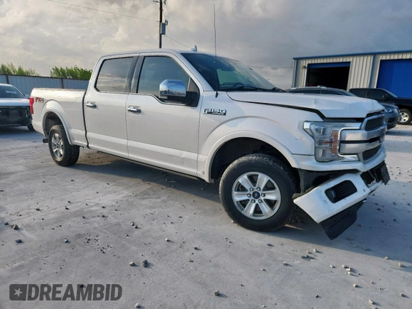 2018 Ford F-150 XL with VIN 1FTFW1EG0JFC00413, listed as a Copart auction lot 63479205 with 204,400 mi miles and Salvage title. Bid and sale history available at DreamBid. Image 4.