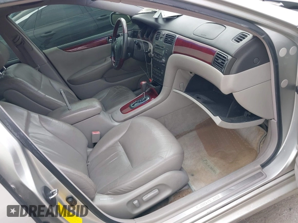 2003 Lexus ES 300 with VIN JTHBF30G730114098, listed as a IAAI auction lot 41793862 with 162,984 mi miles and . Bid and sale history available at DreamBid. Image 5.