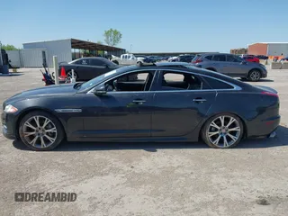 2015 Jaguar XJ R-Sport with VIN SAJWJ1CD6F8V83990, listed as a IAAI auction lot 41936162 with Not Provided miles and . Bid and sale history available at DreamBid. Image 14.