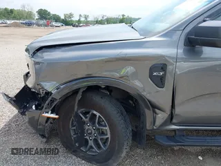 2024 Ford Ranger XLT z VIN 1FTER4HH3RLE16911, wystawiony jako IAAI lot #42596544 z przebiegiem 16 657 mil mil oraz . Historia ofert i sprzedaży dostępna na DreamBid. Obrazek 18.