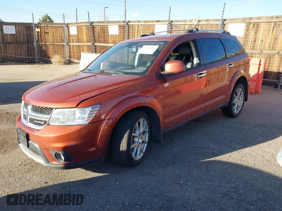 2014 Dodge Journey R/T with VIN 3C4PDDFG4ET104127, listed as a IAAI auction lot 40702930 with 87,058 mi miles and . Bid and sale history available at DreamBid. Image 2.