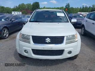 2010 Suzuki Grand Vitara XSport z VIN JS3TE0D48A4100189, wystawiony jako IAAI lot #42500701 z przebiegiem 135 346 mil mil oraz . Historia ofert i sprzedaży dostępna na DreamBid. Obrazek 12.