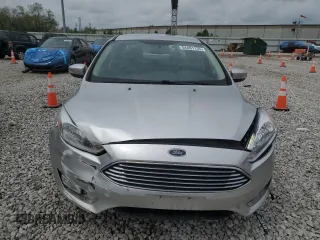 2016 Ford Focus Titanium with VIN 1FADP3J22GL354941, listed as a Copart auction lot 54401135 with 144,142 mi miles and Salvage title. Bid and sale history available at DreamBid. Image 5.