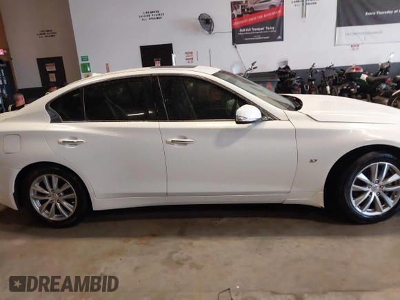 2014 Infiniti Q50 Premium z VIN JN1BV7AP0EM679026, wystawiony jako IAAI lot #42225108 z przebiegiem 96 656 mil mil oraz . Historia ofert i sprzedaży dostępna na DreamBid. Obrazek 14.
