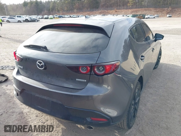 2021 Mazda 3 Premium with VIN JM1BPAML2M1310374, listed as a IAAI auction lot 41190608 with 97,648 mi miles and . Bid and sale history available at DreamBid. Image 4.