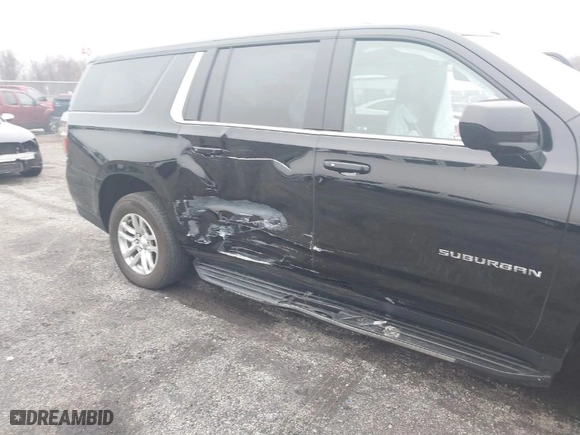 2023 Chevrolet Suburban LT with VIN 1GNSKCKD0PR129079, listed as a IAAI auction lot 41547855 with 158,820 mi miles. Bid and sale history available at carsss.com. Image 6.
