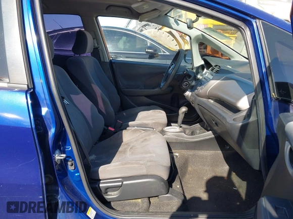2009 Honda Fit with VIN JHMGE88279S071667, listed as a IAAI auction lot 42035664 with 235,791 mi miles. Bid and sale history available at carsss.com. Image 5.