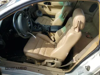 1999 Mitsubishi 3000GT z VIN JA3AM44H2XY002634, wystawiony jako Copart lot #73501144 z przebiegiem 70 229 mil mil oraz Tytuł czysty. Historia ofert i sprzedaży dostępna na DreamBid. Obrazek 7.