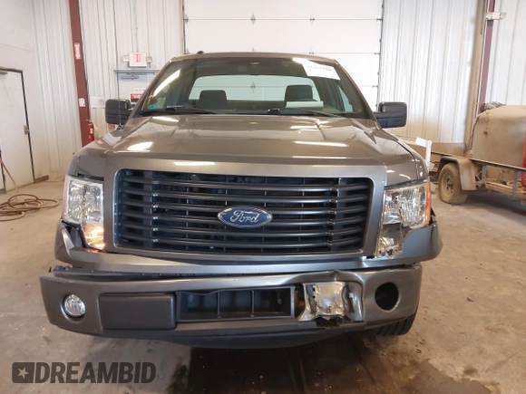 2014 Ford F-150 XL with VIN 1FTMF1CF7EFC67887, listed as a IAAI auction lot 41961500 with 83,934 mi miles and . Bid and sale history available at DreamBid. Image 12.