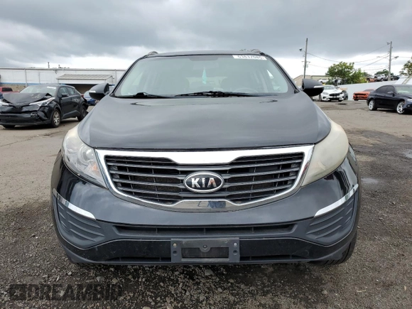 2011 Kia Sportage LX with VIN KNDPBCA24B7012852, listed as a Copart auction lot 63837085 with 186,805 mi miles and Salvage title. Bid and sale history available at DreamBid. Image 5.