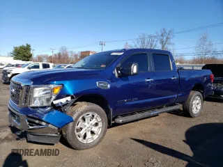2017 Nissan Titan XD PRO-4X with VIN 1N6AA1F43HN504281, listed as a Copart auction lot 82169004 with 76,811 mi miles and Salvage Title. Bid and sale history available at carsss.com. Image 1.