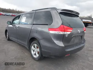 2013 Toyota Sienna LE with VIN 5TDJK3DC1DS049621, listed as a IAAI auction lot 42027930 with 206,148 mi miles and . Bid and sale history available at DreamBid. Image 3.