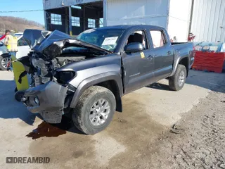 2017 Toyota Tacoma SR5 with VIN 5TFCZ5AN0HX063077, listed as a IAAI auction lot 41887043 with 142,015 mi miles. Bid and sale history available at carsss.com. Image 2.