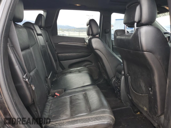 2014 Jeep Grand Cherokee Limited z VIN 1C4RJFBT6EC184557, wystawiony jako Copart lot #57657095 z przebiegiem 157 688 mil mil oraz Szkoda całkowita • Salvage title. Historia ofert i sprzedaży dostępna na DreamBid. Obrazek 11.