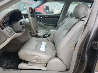 2000 Cadillac DeVille DTS with VIN 1G6KF5794YU249059, listed as a Copart auction lot 71614494 with 121,611 mi miles and Salvage Title. Bid and sale history available at carsss.com. Image 7.