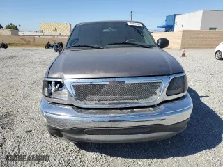 2003 Ford F-150 XL with VIN 1FTRX07233KC40260, listed as a Copart auction lot 78007404 with 85,222 mi miles and Salvage Title. Bid and sale history available at carsss.com. Image 5.