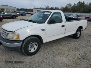 1999 Ford F-150 Work Series with VIN 1FTRF17W1XNA20017, listed as a Copart auction lot 84550234 with 0 mi miles and Salvage Title. Bid and sale history available at carsss.com. Image 1.