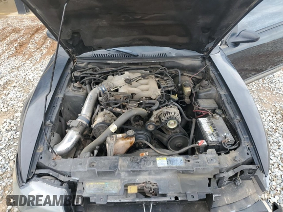 2003 Ford Mustang Deluxe z VIN 1FAFP44433F364091, wystawiony jako Copart lot #54061935 z przebiegiem 201 406 mil mil oraz Szkoda całkowita • Salvage title. Historia ofert i sprzedaży dostępna na DreamBid. Obrazek 11.