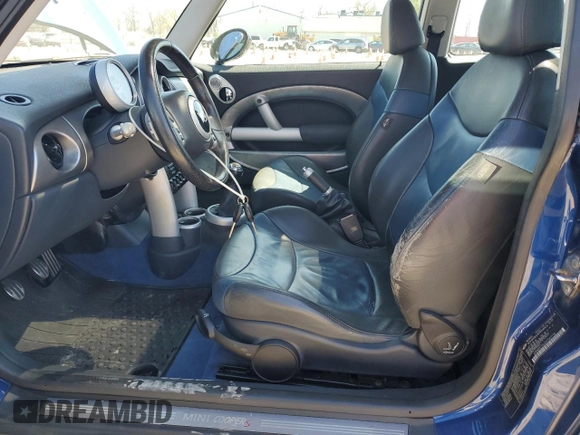 2003 MINI Hardtop S with VIN WMWRE33423TD67736, listed as a Copart auction lot 53428565 with 148,784 mi miles and Clean Title. Bid and sale history available at DreamBid. Image 7.