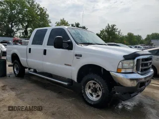 2004 Ford Super Duty F-250 XL with VIN 1FTNW21P14EA23582, listed as a Copart auction lot 62658954 with 205,382 mi miles and Salvage Title. Bid and sale history available at carsss.com. Image 4.
