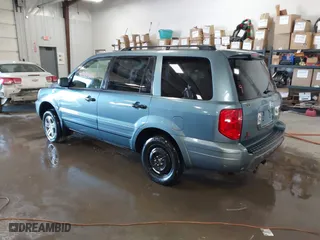 2005 Honda Pilot EX-L with VIN 2HKYF18545H504245, listed as a IAAI auction lot 41715449 with 236,985 mi miles. Bid and sale history available at carsss.com. Image 3.