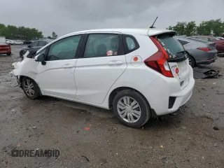 2015 Honda Fit LX with VIN 3HGGK5H57FM722000, listed as a Copart auction lot 57331455 with 140,546 mi miles and Salvage title. Bid and sale history available at DreamBid. Image 2.