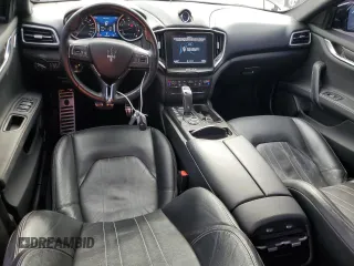 2019 Maserati Ghibli с VIN ZAM57XSA3K1311169, выставлен на аукционе Copart как лот 49583325 с пробегом 66 290 миль миль и Списание • Salvage title. История ставок и продаж доступна на DreamBid. Изображение 8.