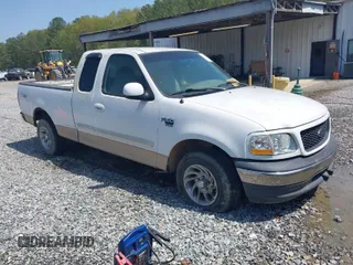 2000 Ford F-150 XL with VIN 1FTRX17L0YNA55913, listed as a IAAI auction lot 41914332 with 1 mi miles. Bid and sale history available at carsss.com. Image 1.