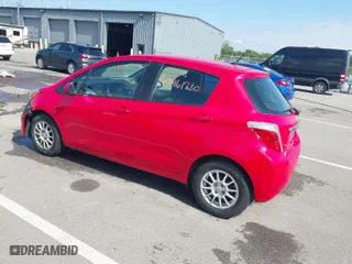 2014 Toyota Yaris L with VIN JTDKTUD36ED592371, listed as a IAAI auction lot 40461730 with 164,423 mi miles. Bid and sale history available at carsss.com. Image 3.