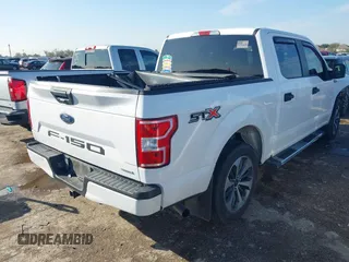 2019 Ford F-150 XL with VIN 1FTEW1CPXKKF00869, listed as a IAAI auction lot 41197442 with 77,487 mi miles and . Bid and sale history available at DreamBid. Image 4.