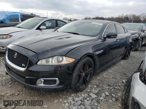 2014 Jaguar XJ with VIN SAJWA2EKXEMV64494, listed as a Copart auction lot 82634004 with 119,811 mi miles and Clean title. Bid and sale history available at DreamBid. Image 1.
