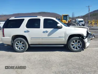2011 GMC Yukon Denali with VIN 1GKS2EEF8BR237643, listed as a IAAI auction lot 41811822 with 134,309 mi miles. Bid and sale history available at carsss.com. Image 13.