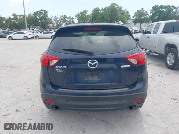 2014 Mazda CX-5 Grand Touring with VIN JM3KE2DY8E0425258, listed as a IAAI auction lot 42179452 with 132,137 mi miles. Bid and sale history available at carsss.com. Image 16.